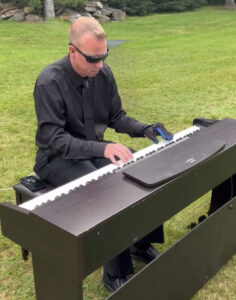 Shawn Hogan, One Hand Piano Man